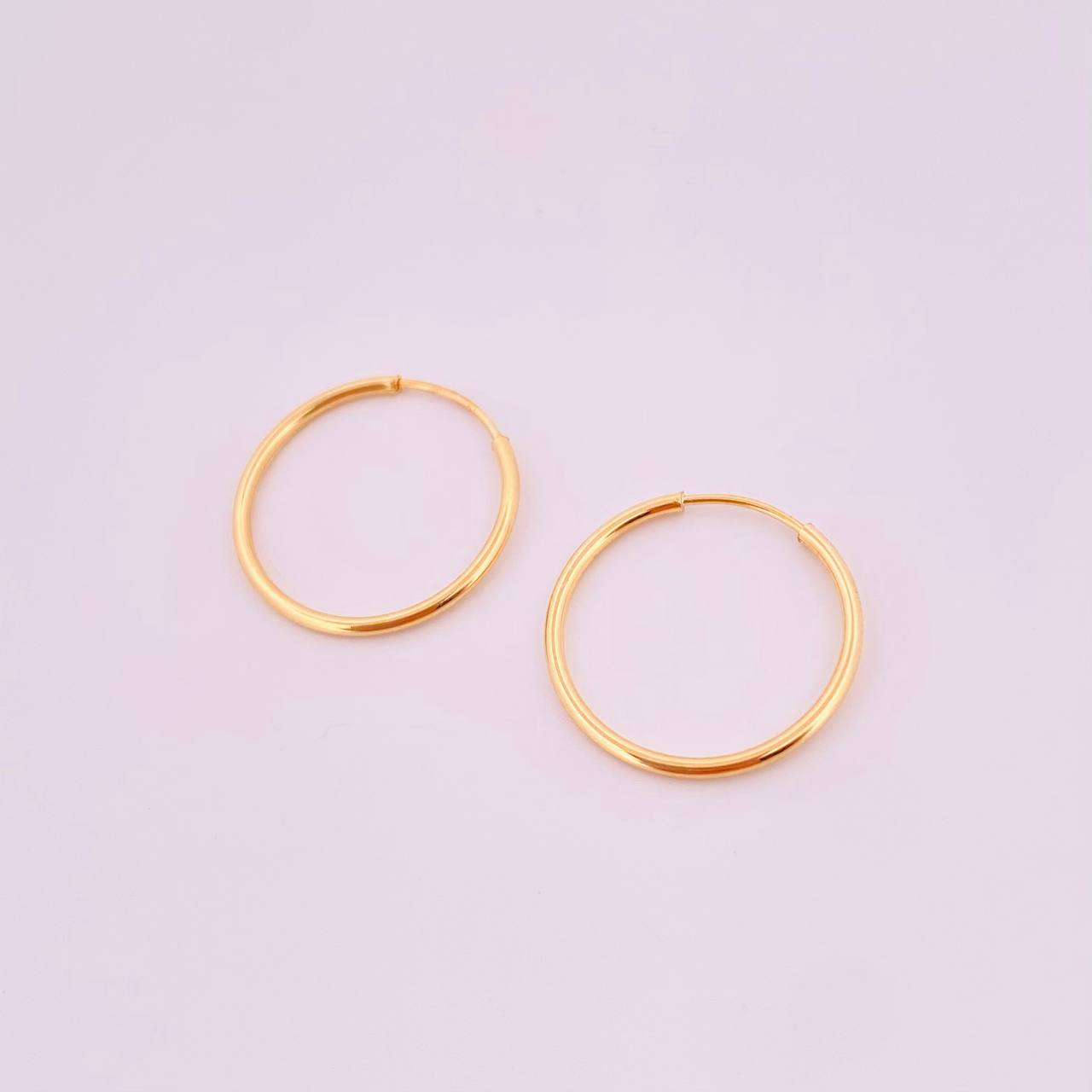 Candongas Aro Liso 0.75gr / 1.6cm / Oro Amarillo 18K *