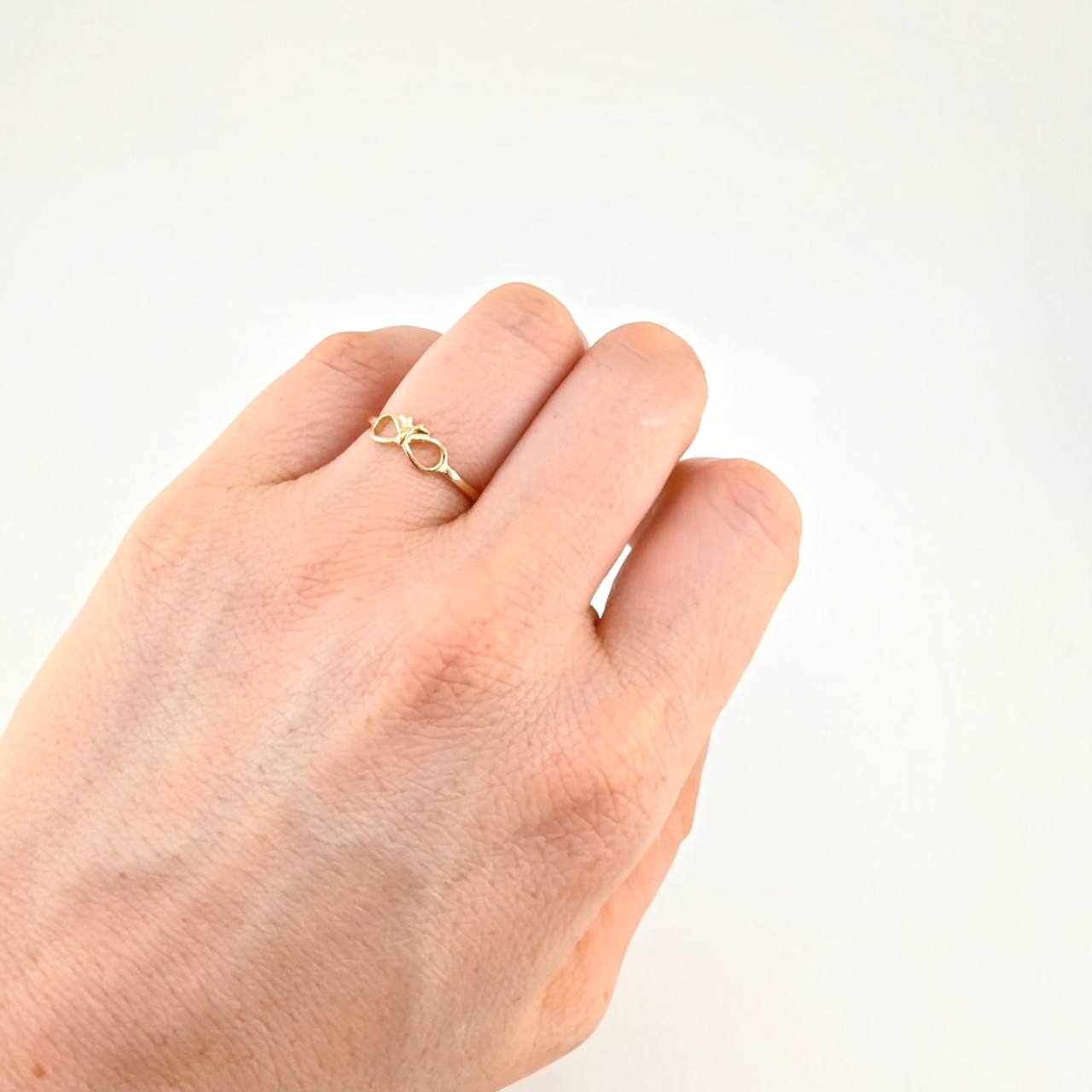 Anillo Moño Infinito 1.35 g / T5 1/2 Oro Amarillo 18K