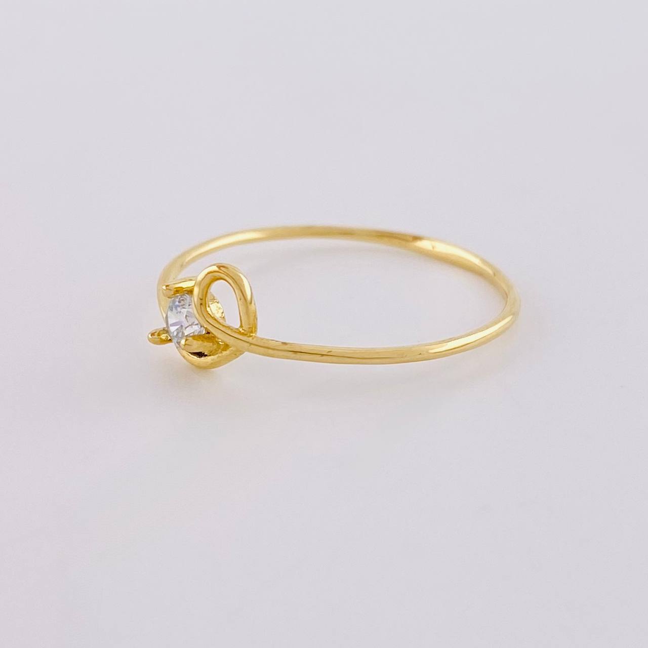 Anillo Chispa Cursiva 0.85 g / T7 3/4 Oro Amarillo 18K