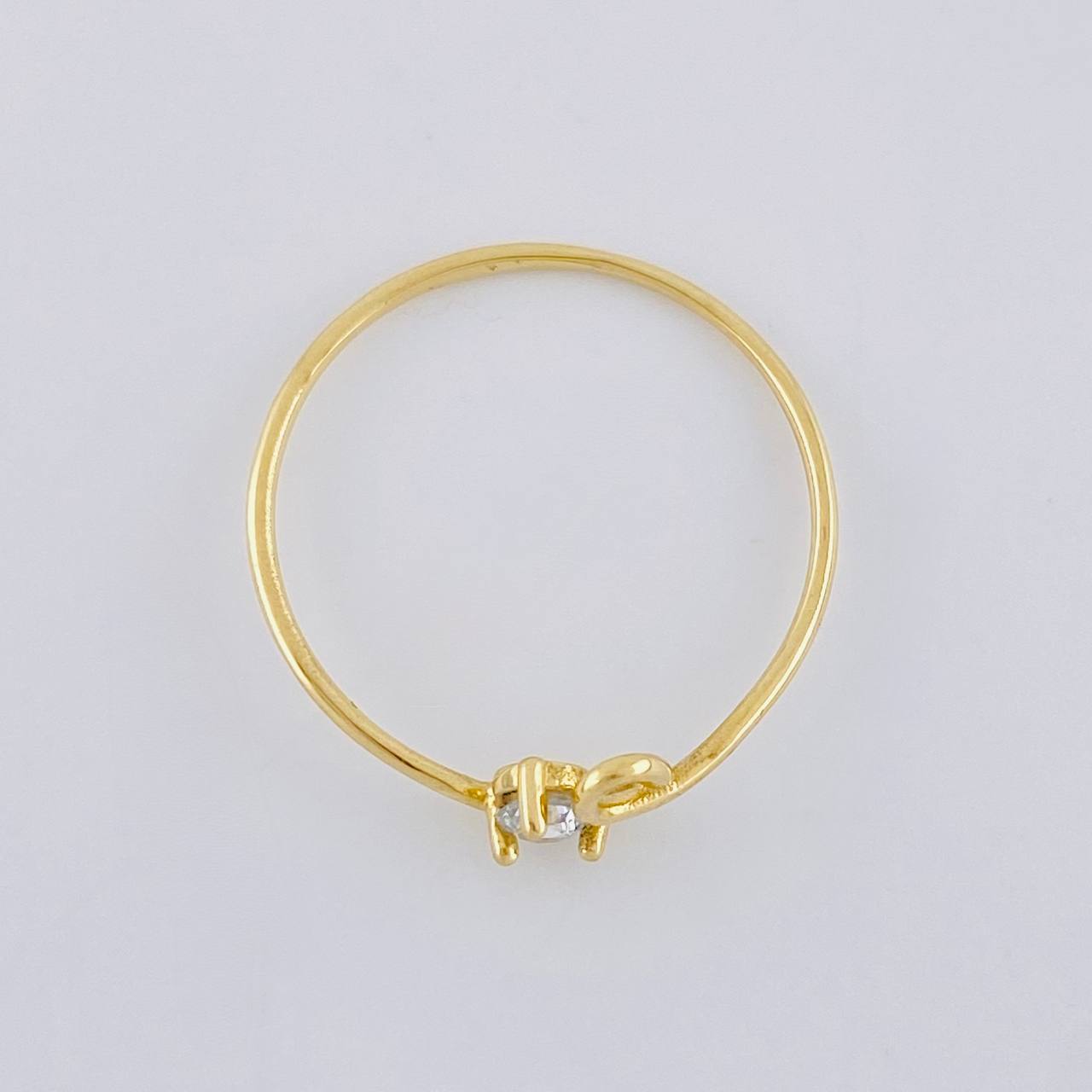 Anillo Chispa Cursiva 0.85 g / T7 3/4 Oro Amarillo 18K