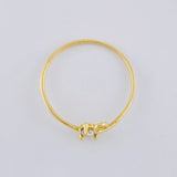 Anillo Chispa Cursiva 0.85 g / T7 3/4 Oro Amarillo 18K