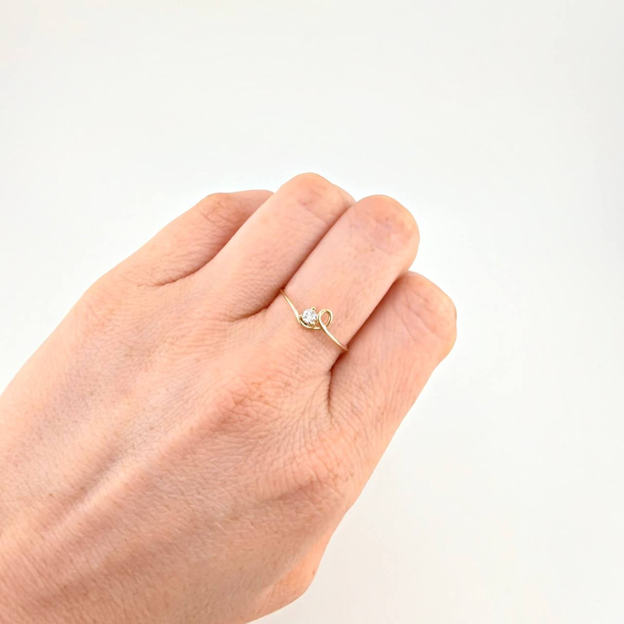 Anillo Chispa Cursiva 0.85 g / T7 3/4 Oro Amarillo 18K