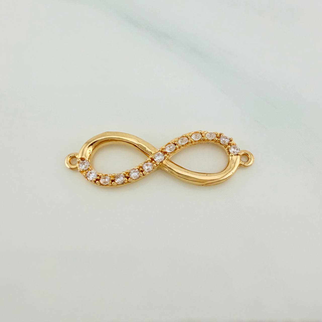 Herraje Infinito 1.55gr / 2.7cm / Oro Amarillo 18K