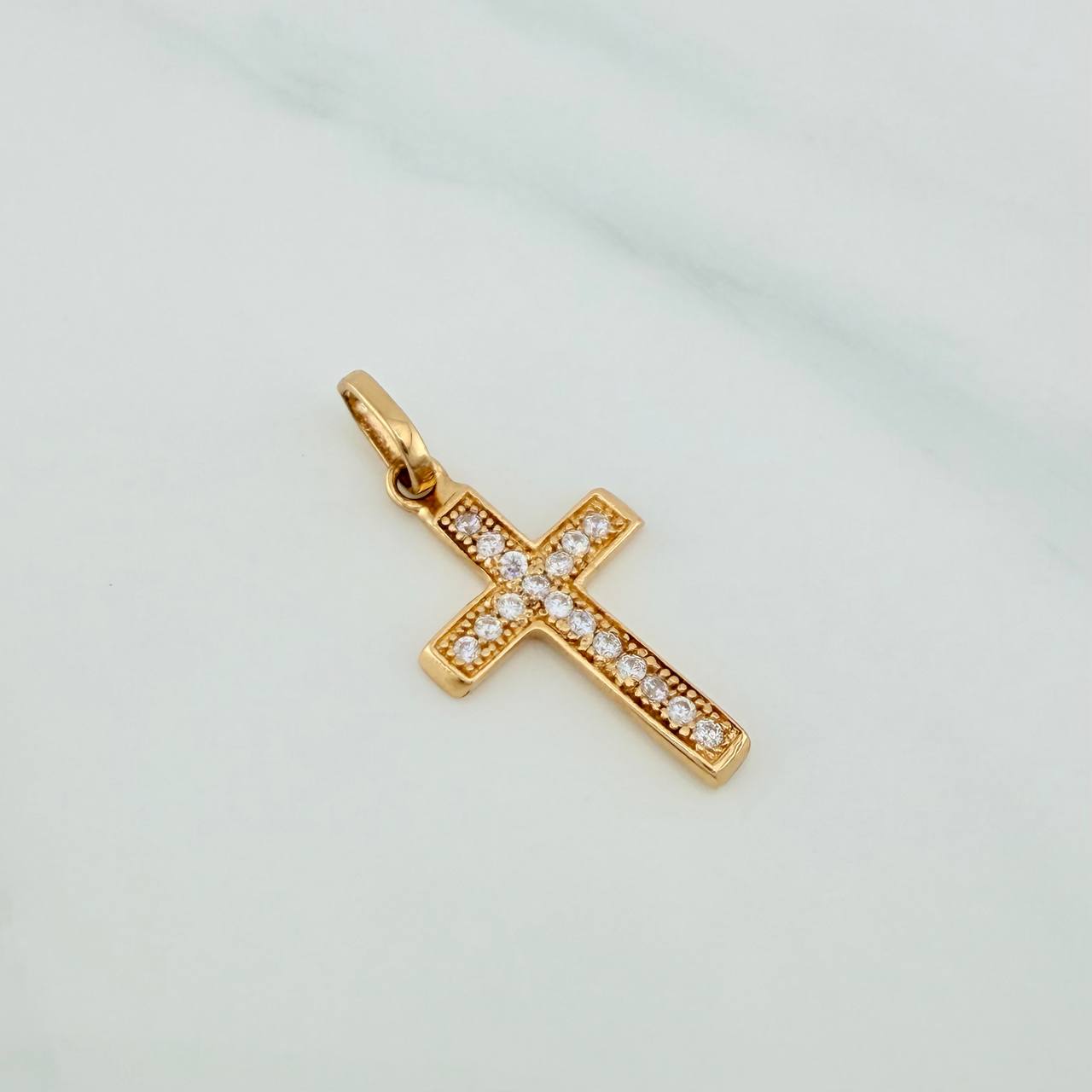 Dije Cruz 0.95gr / 2.6cm / Oro Amarillo 18K &