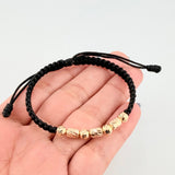 Pulsera Negra Cilindros Interceptos 7und / 4mm-5mm Oro Amarillo 18K *