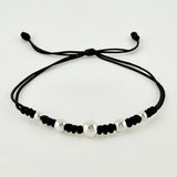 Pulsera Negra Secuencia Lisa 5und / 3mm-5mm Oro Blanco 18K *
