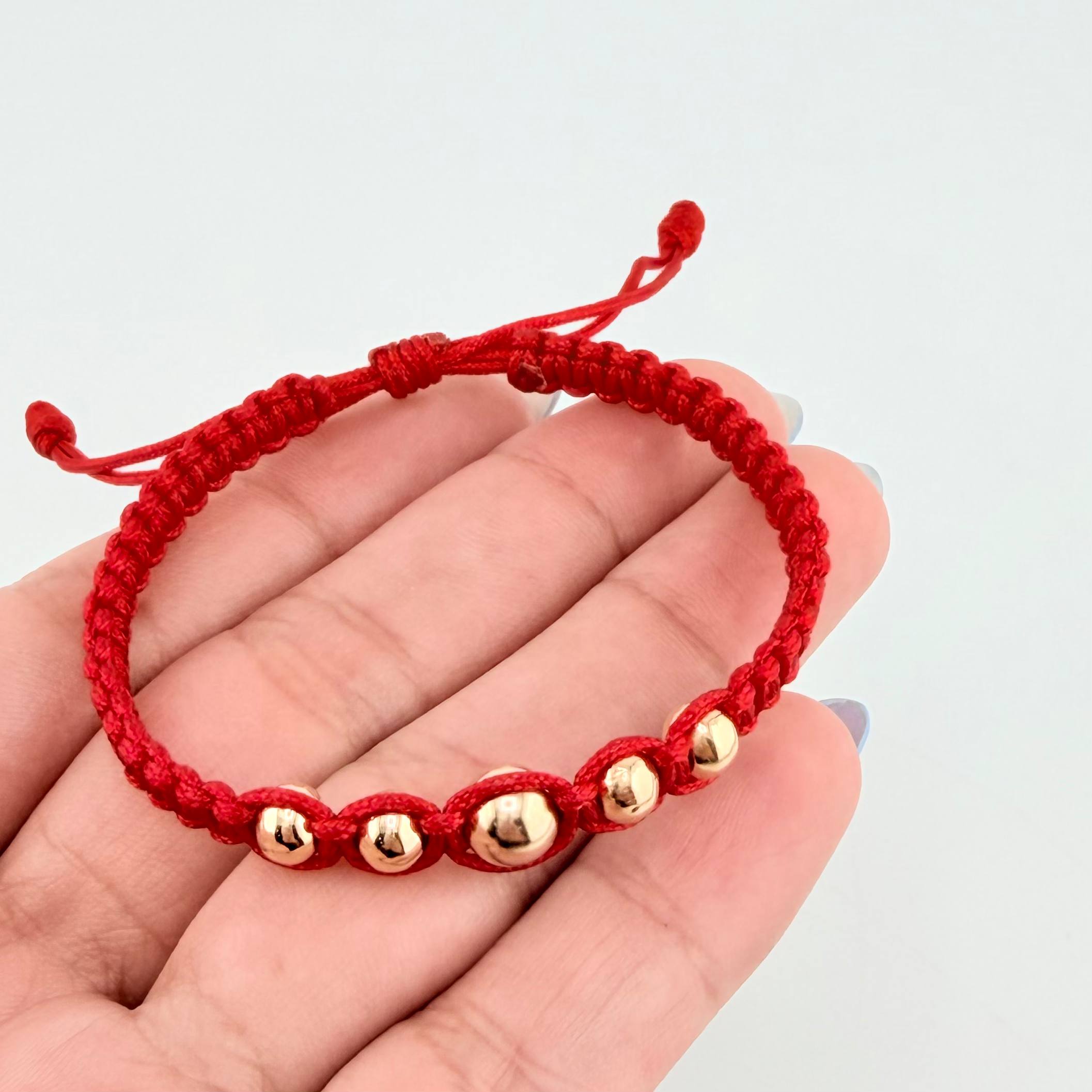 Pulsera Roja Bolas Pentatonicas 5und / 5mm-6mm Oro Amarillo 18K *