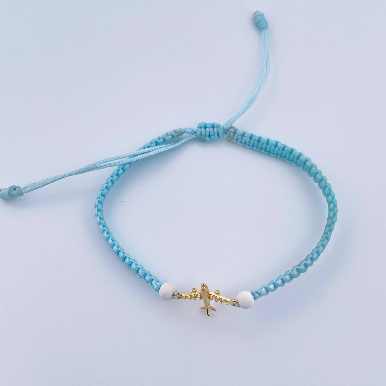 Pulsera Celeste Herraje Avion 0.45gr / 4mm Neoprenos Troquelado Oro Amarillo 18K &