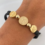 Pulsera Negra Herrajes Trio Religioso 4.35gr / 6mm Bolas Lisas Troquelado Oro Amarillo 18K &