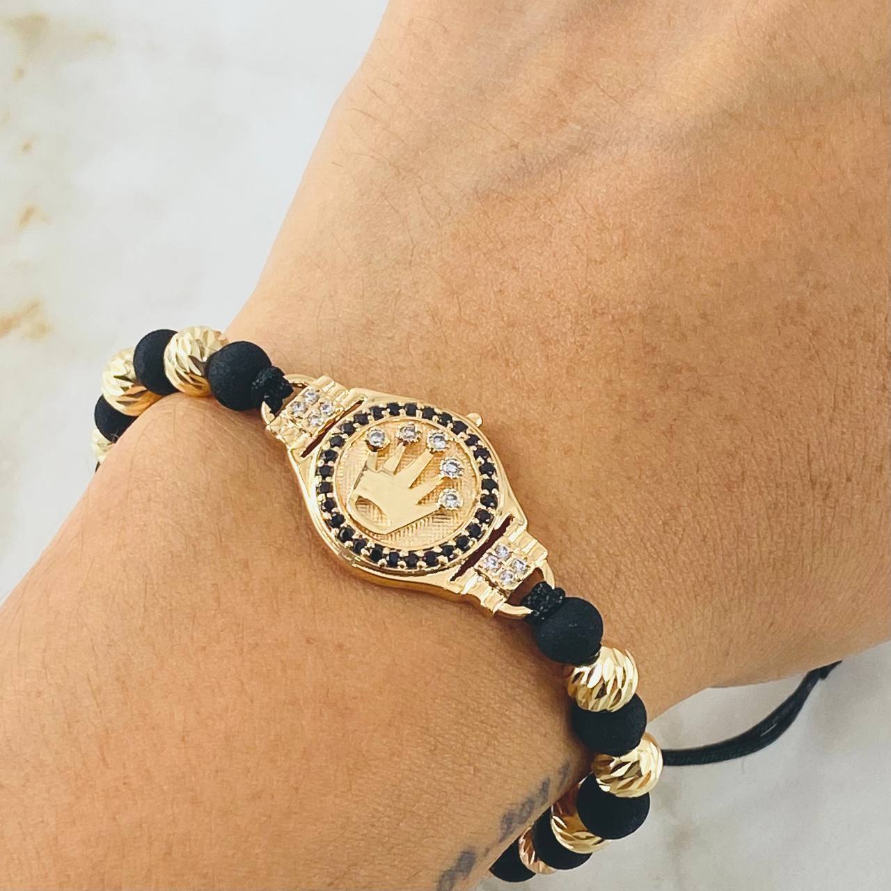 Pulsera Negra Herraje Corona 6.8gr / Dos Oros Amarillo Rosa 18K ©