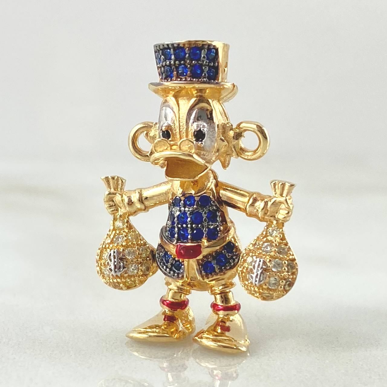 Herraje Pato Bolsa Dinero 5.55gr / 1.3cm / Dos Oros Amarillo Blanco 18K ©