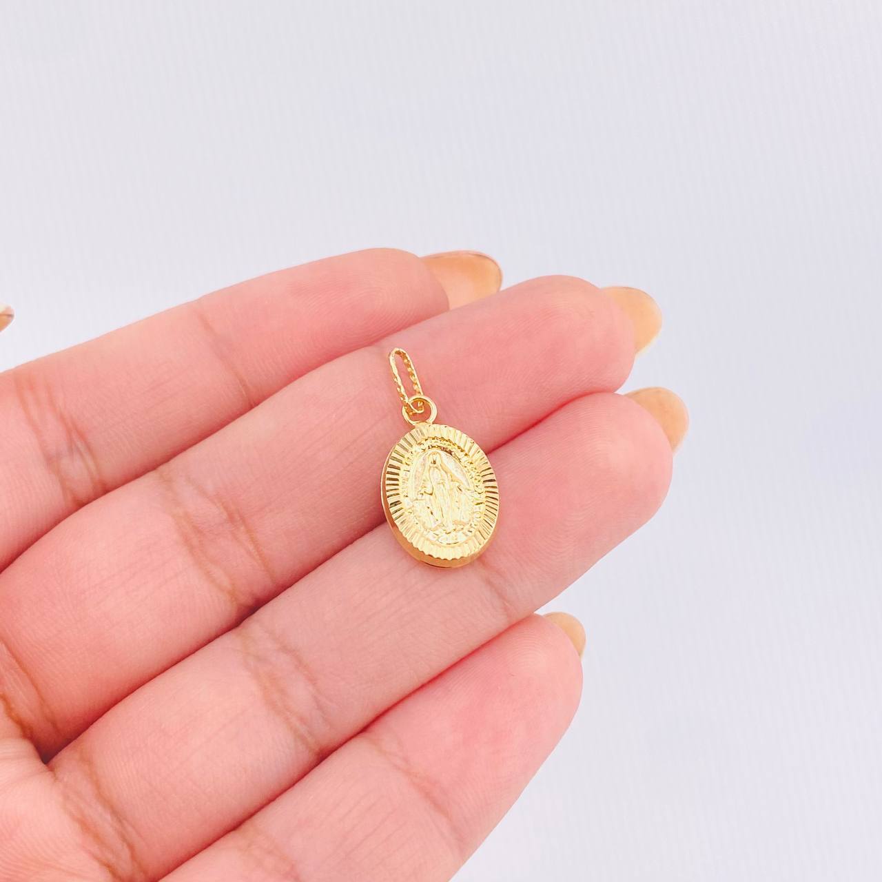 Dije Milagrosa 0.85gr / 2.2cm / Oro Amarillo 18K *
