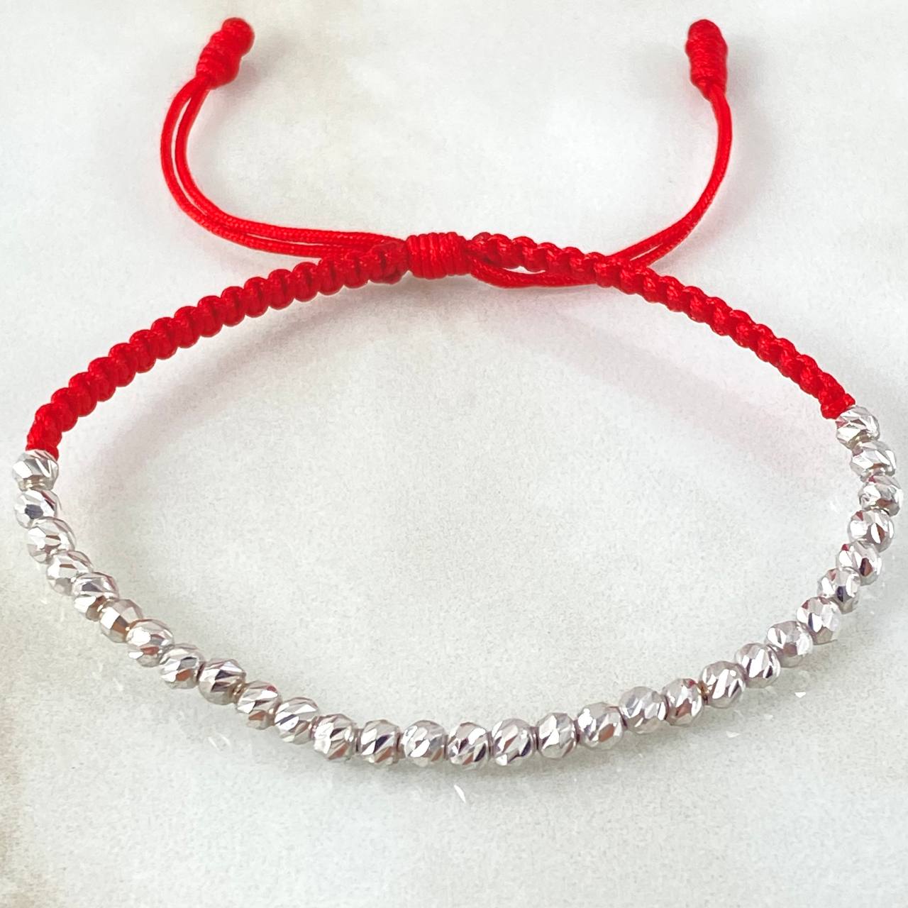 Pulsera Roja Bolas Diamantadas 1.8gr / Oro Blanco 18K ©