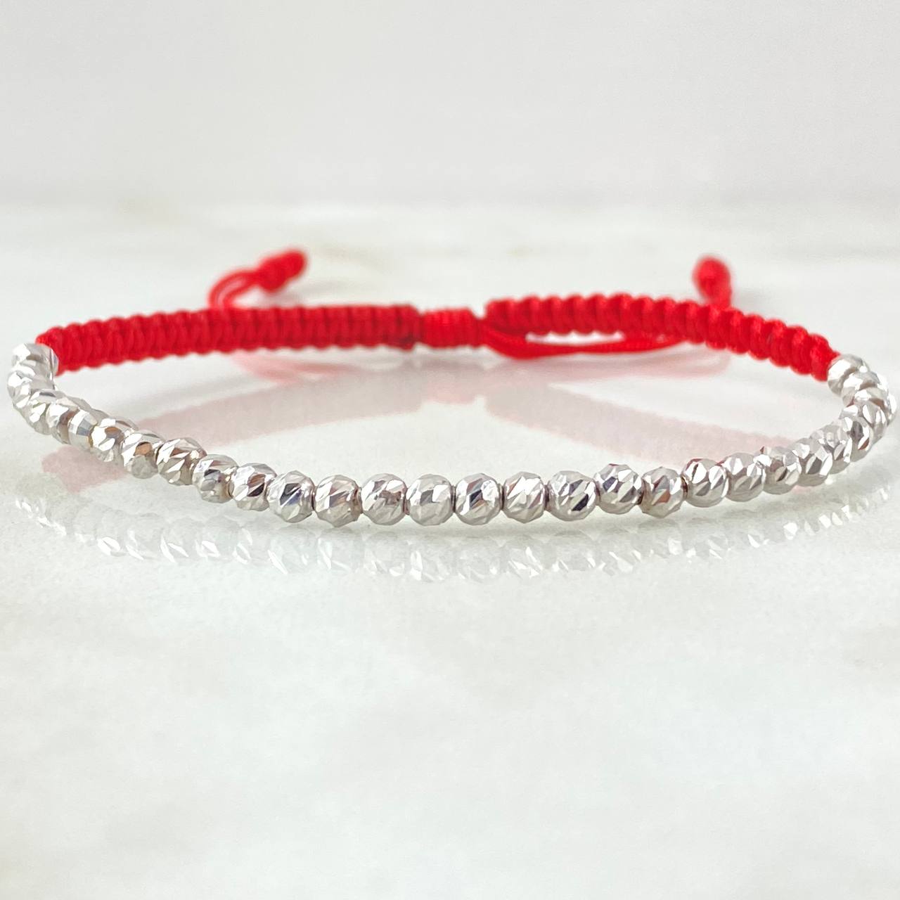 Pulsera Roja Bolas Diamantadas 1.8gr / Oro Blanco 18K ©