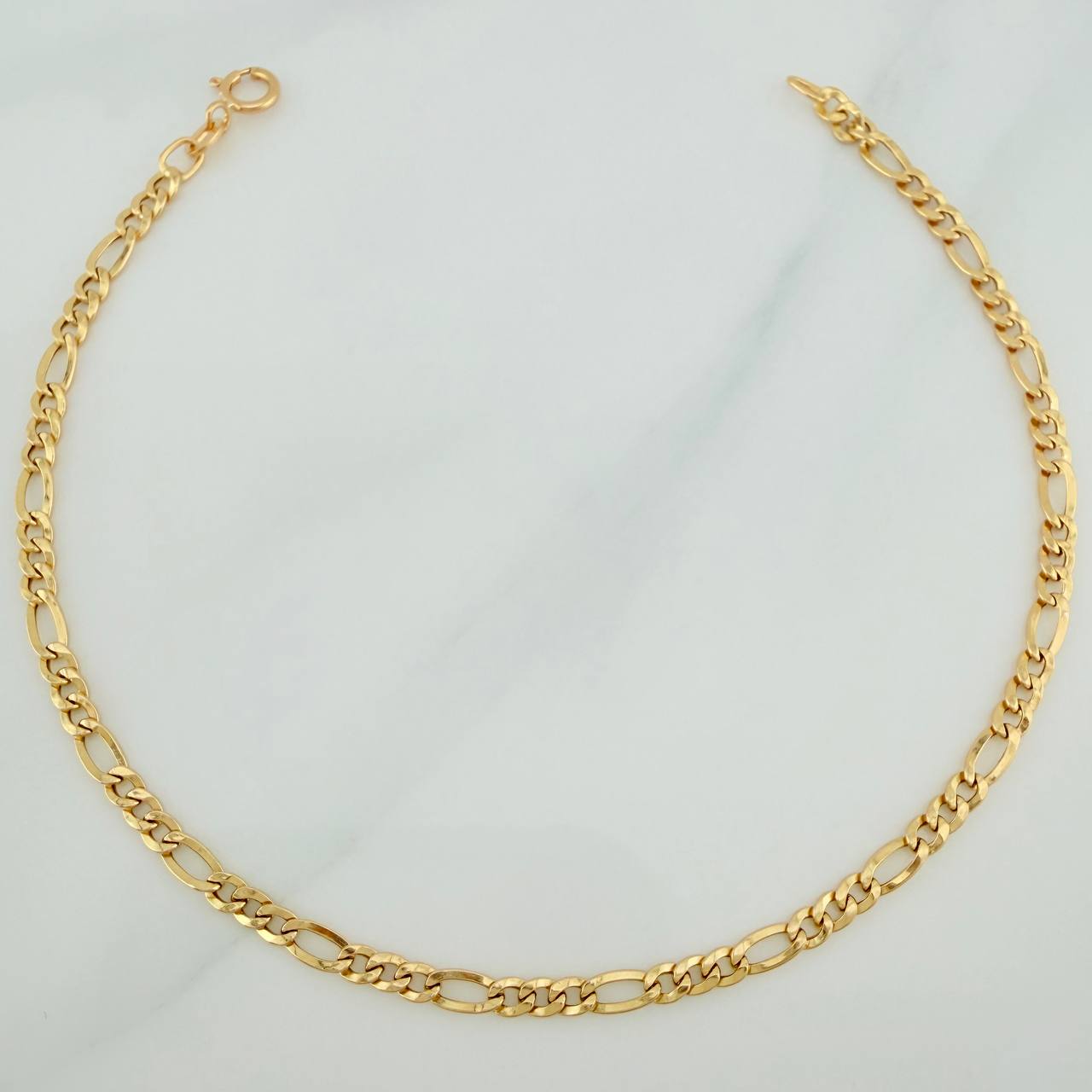 Pulso Figaro 1.05gr / 20cm / 2.4mm Oro Amarillo +1 18K $