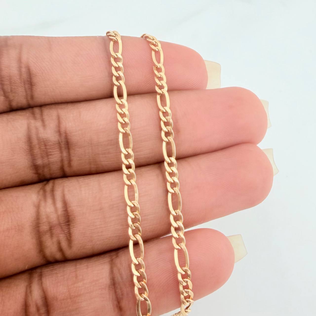 Pulso Figaro 1.05gr / 20cm / 2.4mm Oro Amarillo +1 18K $