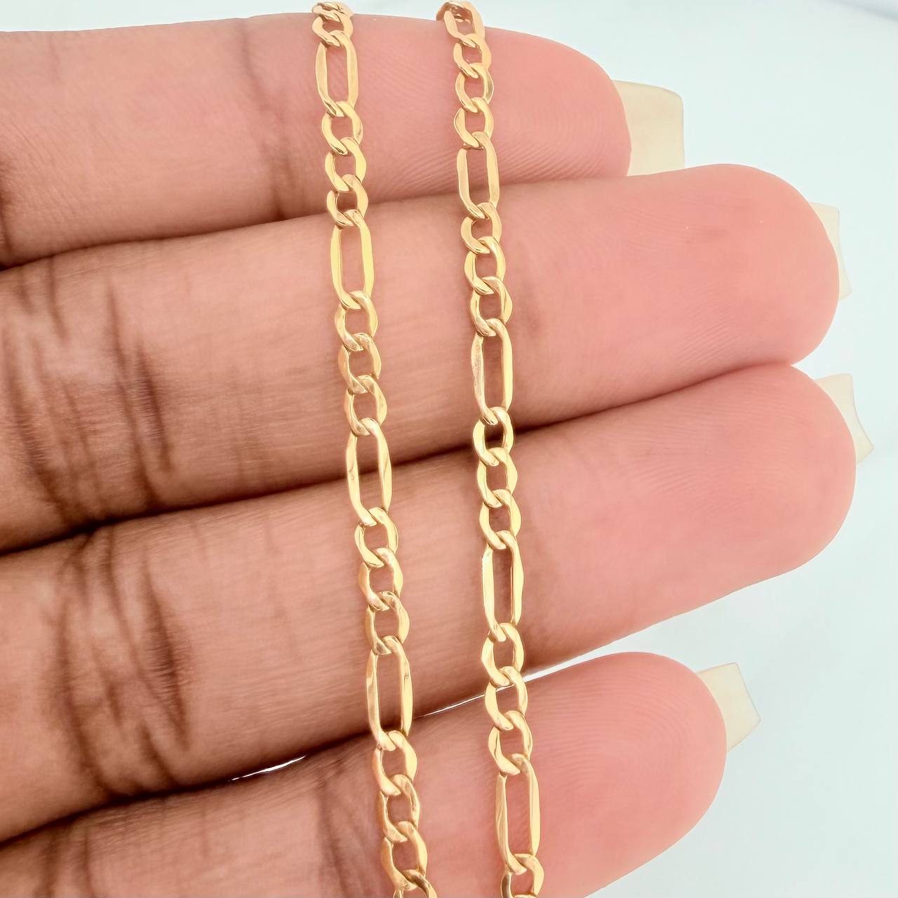 Pulso Figaro 1.15gr / 19cm / 2.3mm Oro Amarillo +1 18K $