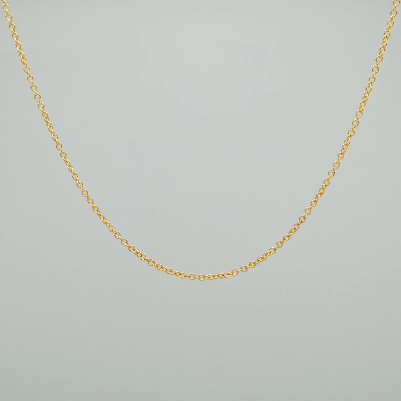 Cadena Aro Seguido 1.25gr / 45.3cm / 0.6mm Oro Amarillo +3 18K %
