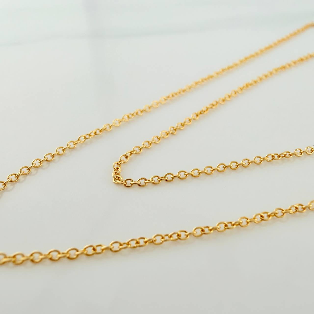 Cadena Aro Seguido 1.25gr / 45.3cm / 0.6mm Oro Amarillo +3 18K %