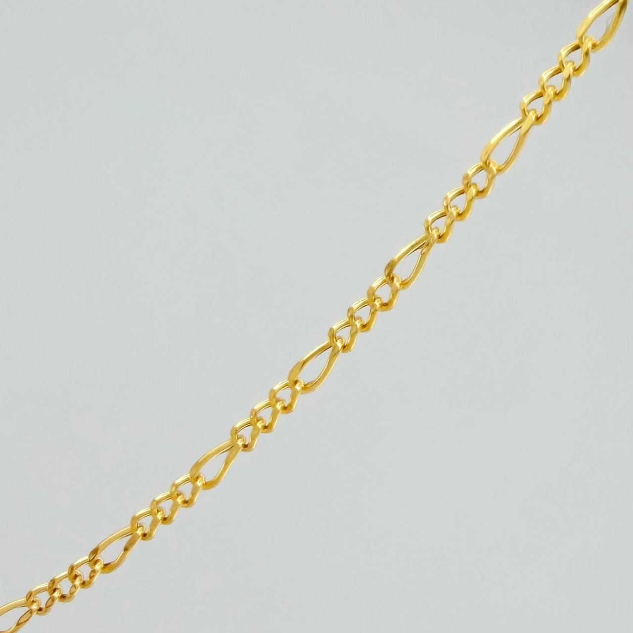 Cadena Figaro 1.35gr / 44.5cm / 1.2mm Oro Amarillo +1 18K &
