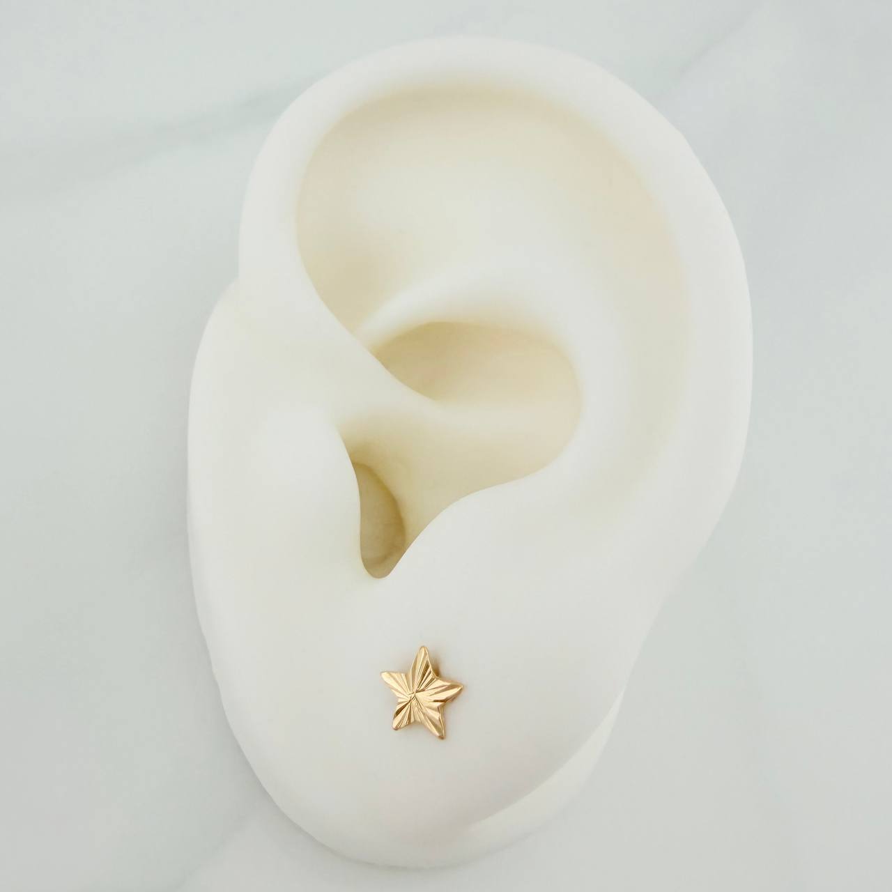 Topos Estrella 0.5gr / 5.6mm Oro Amarillo 18K %