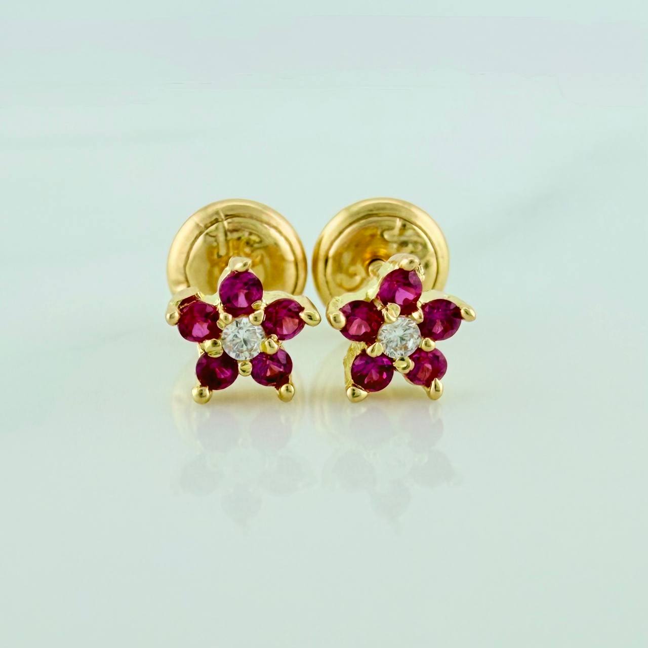 Topos Flor 0.8gr / 4.9mm Oro Amarillo 18K %