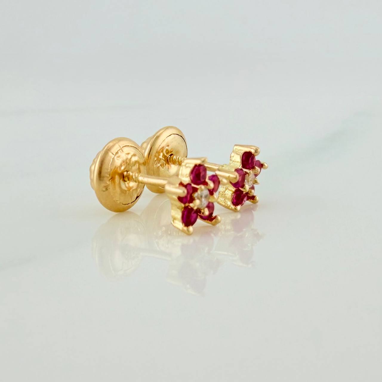 Topos Flor 0.8gr / 4.9mm Oro Amarillo 18K %