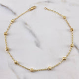 Tobillera Tipo Militar 2.5gr / 25.6cm / 3.6mm Bolas Diamantadas Oro Amarillo 18K $