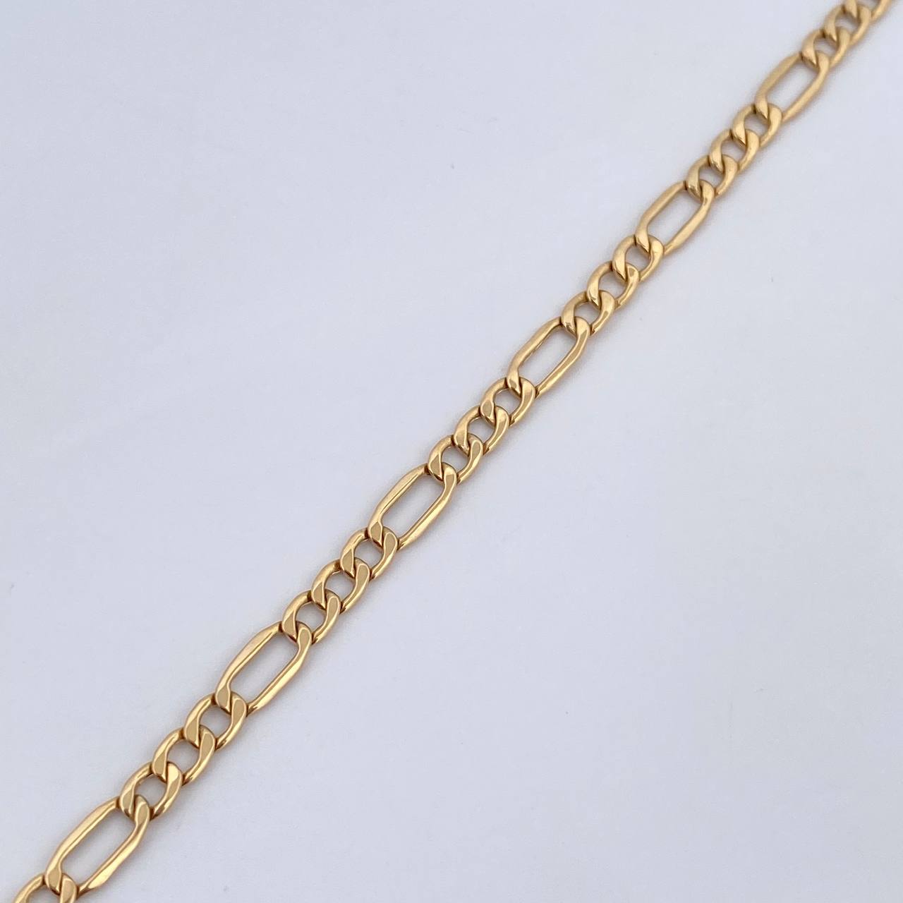 Tobillera Figaro 2.3gr / 24.1cm / 3.1mm Oro Amarillo +1 18K $