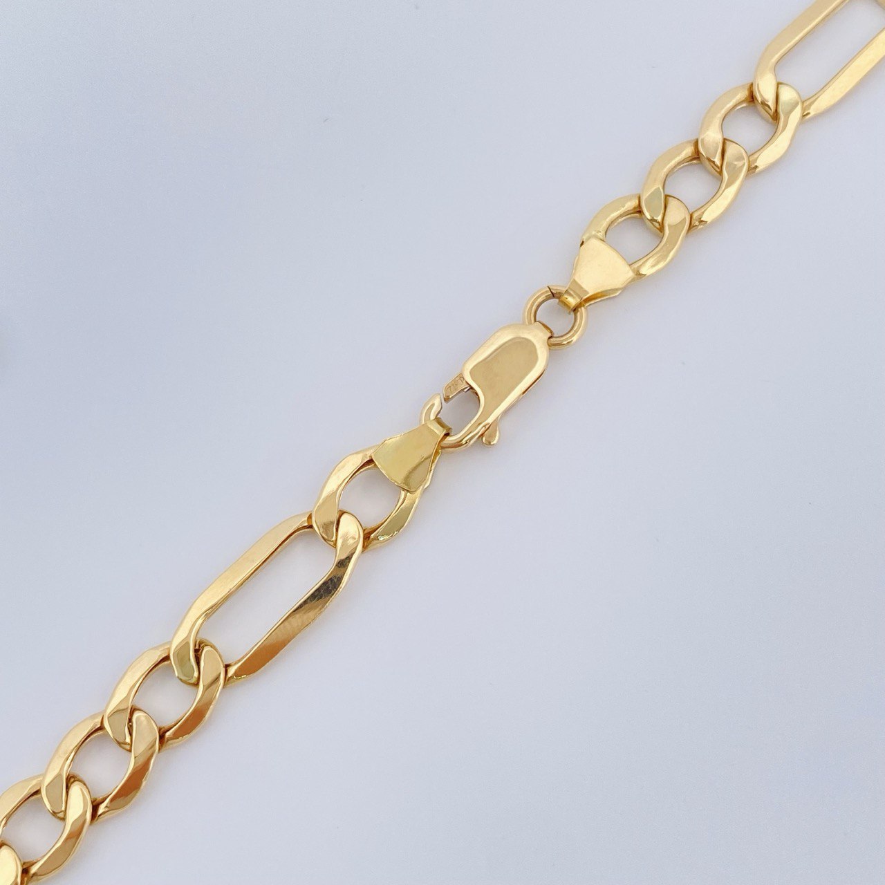 Cadena Figaro 14.95gr / 60cm / Oro Amarillo +1 18K $