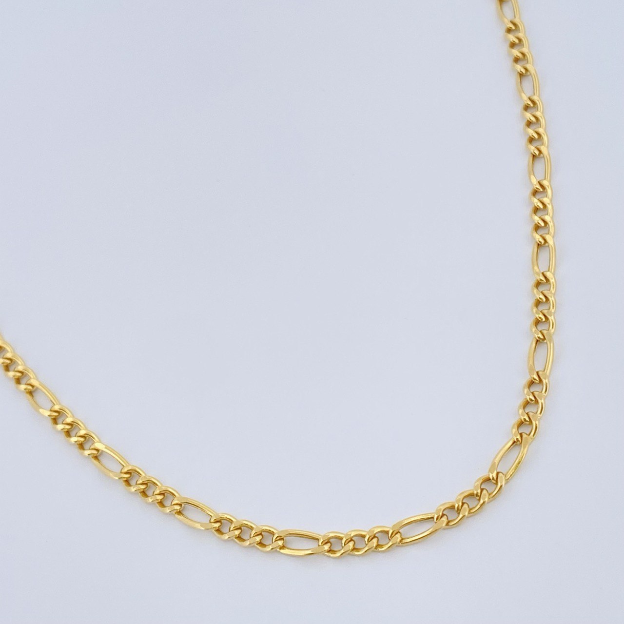 Cadena Figaro 7.3gr / 65.5cm / Oro Amarillo +1 18K $