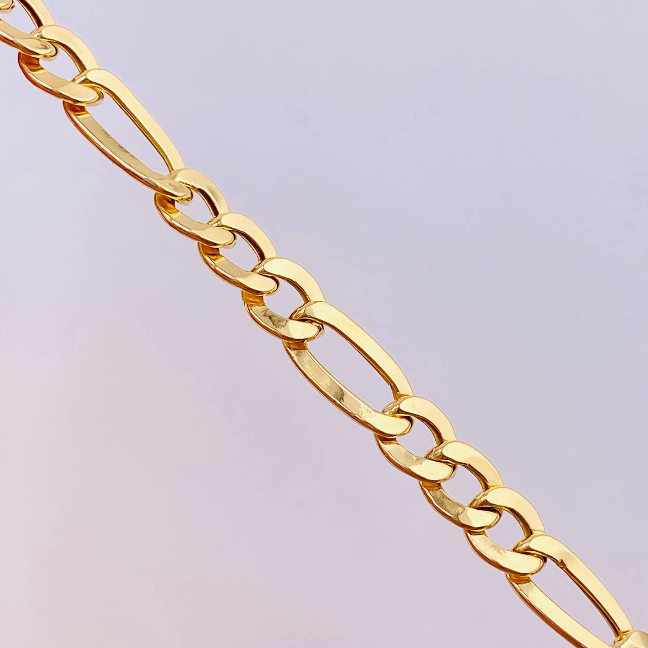 Pulso Figaro 4.85gr / 20cm / 6.15mm Oro Amarillo +1 18K ©