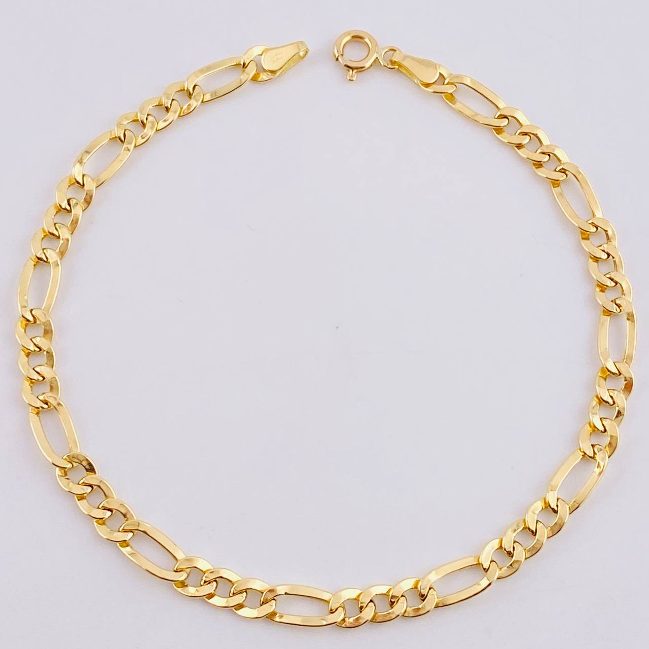 Pulso Figaro 2.6gr / 20cm / 4.45mm Oro Amarillo +1 18K ©