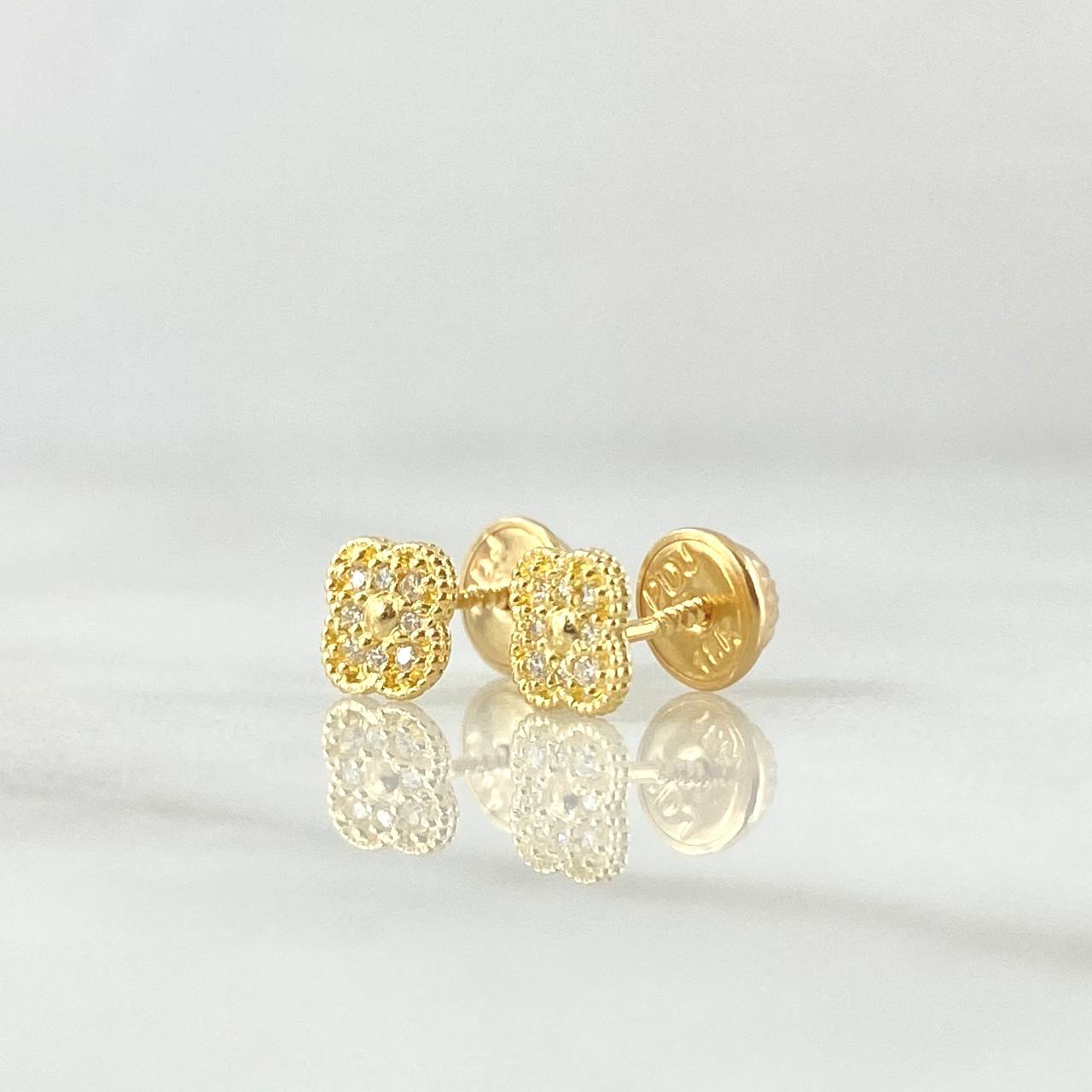 Topos Flor Enmarcada 0.85gr / 5mm Circones Blancos Oro Amarillo 18K