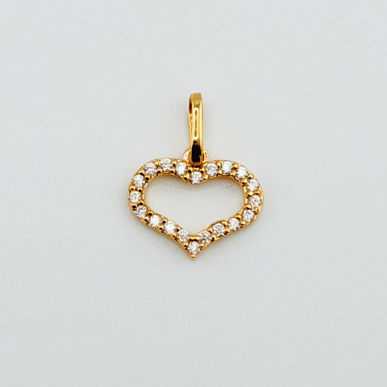 Dije Silueta Corazón Tupido 0.75gr / 1.5cm / Oro Amarillo 18K ©