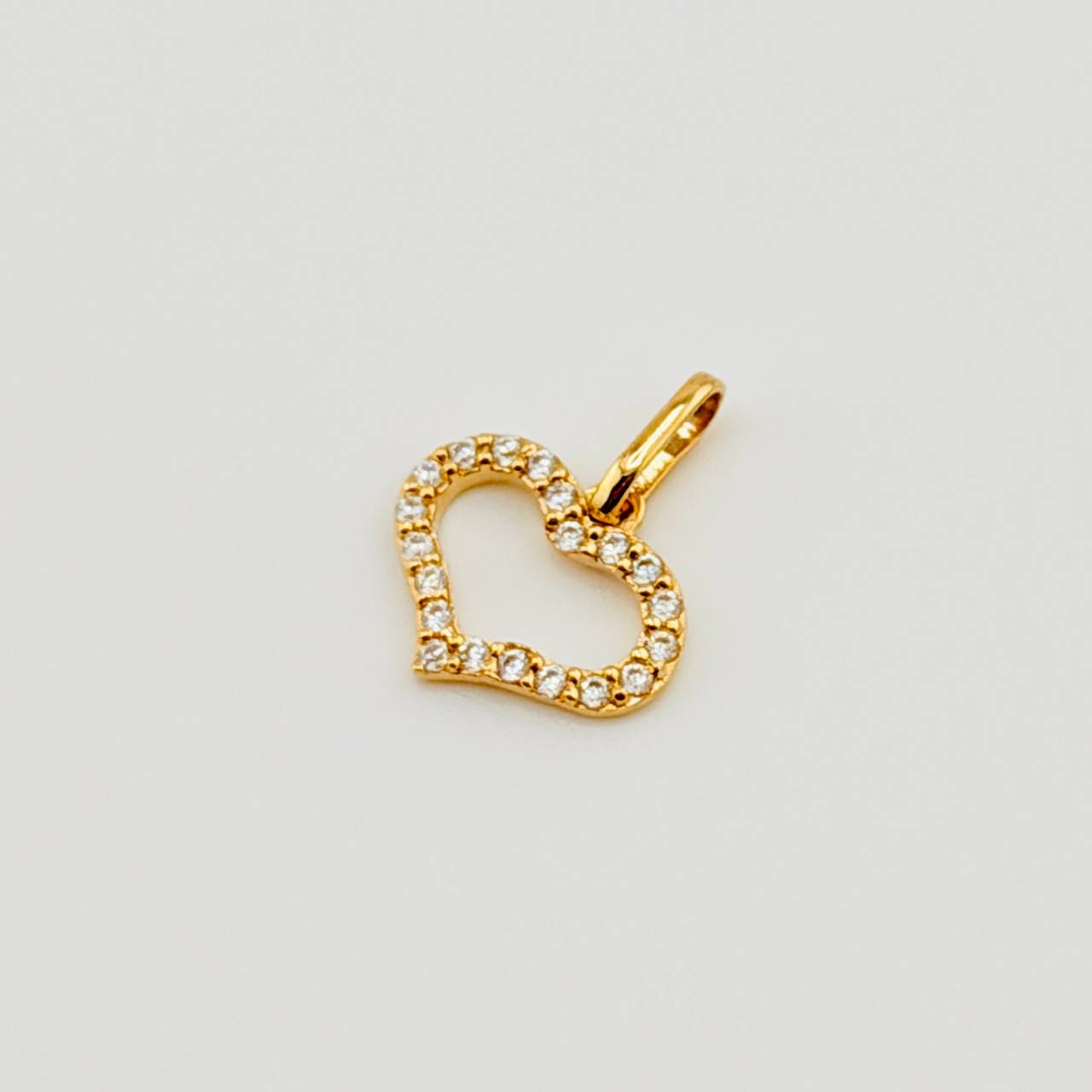 Dije Silueta Corazón Tupido 0.75gr / 1.5cm / Oro Amarillo 18K ©