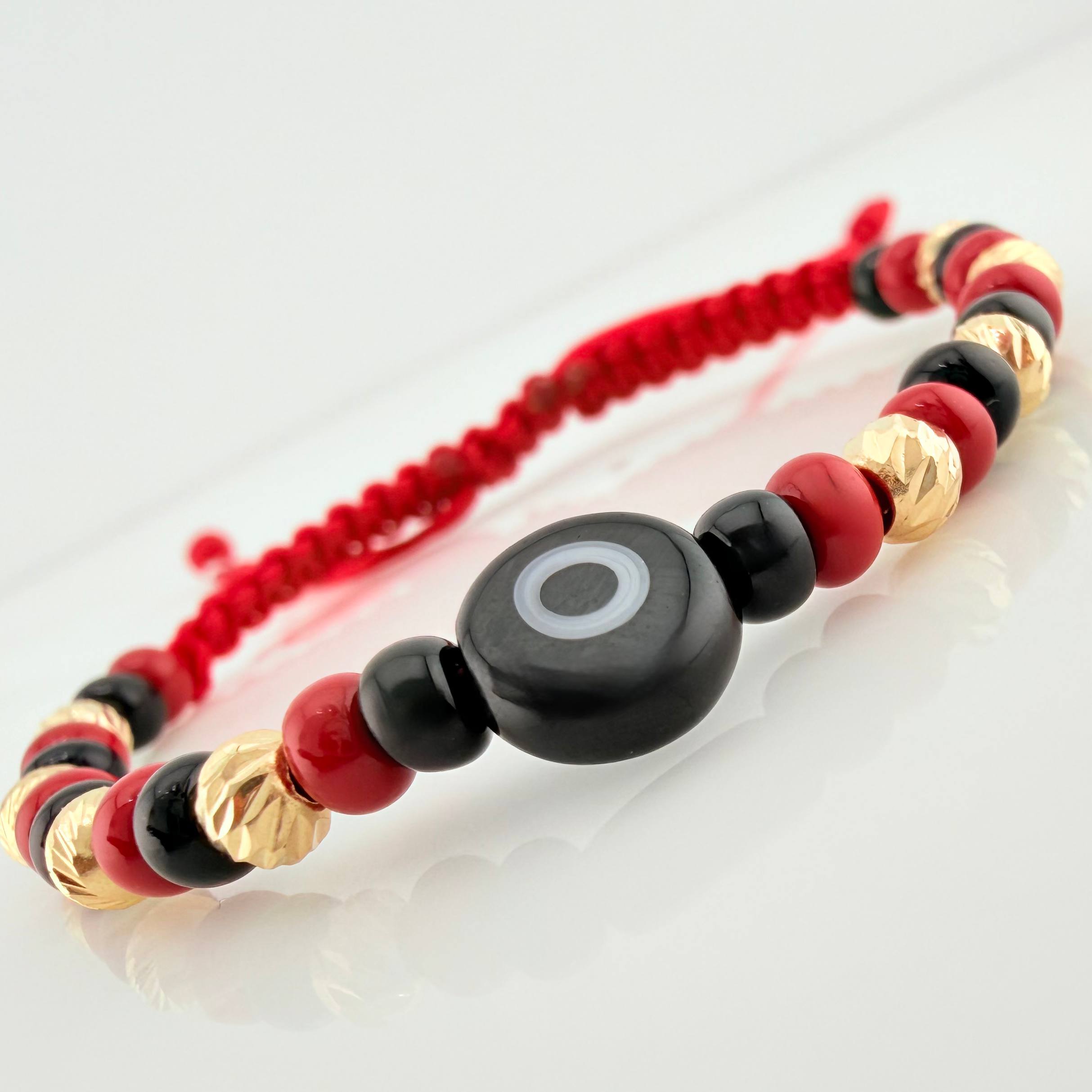 Pulsera Tejida Roja Ojo Turco Oro Amarillo 18K