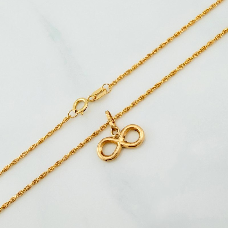 Set Cadena Lazo + Dije Infinito / 1,4 gr / 50 cm Oro Amarillo 18K