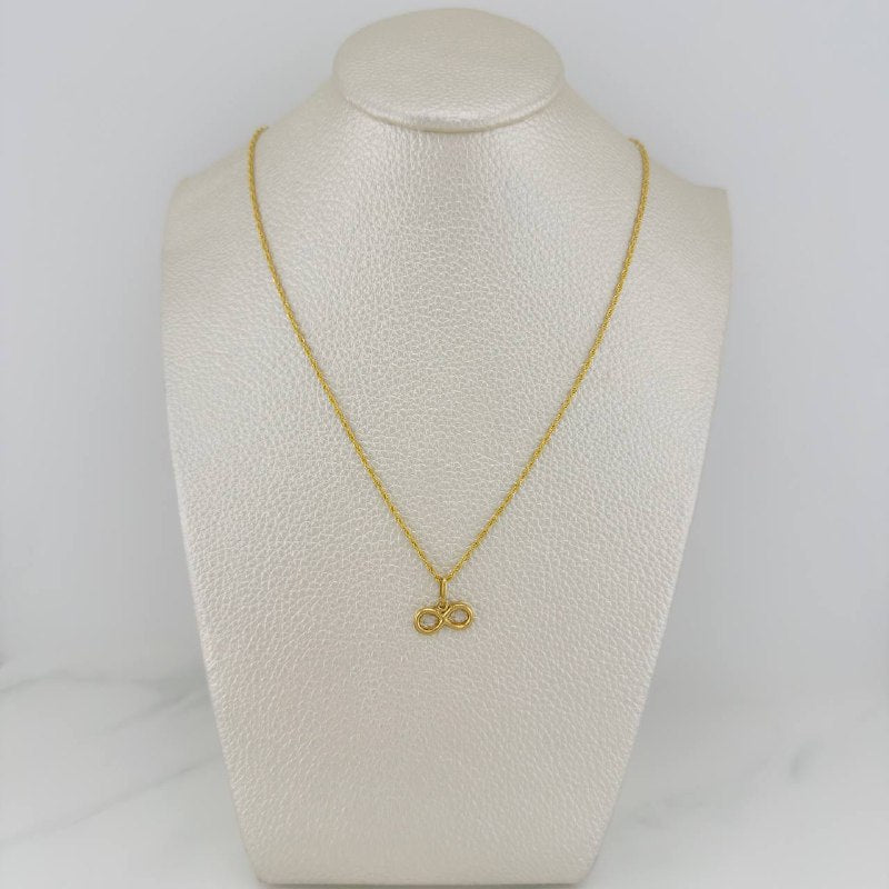 Set Cadena Lazo + Dije Infinito / 1,35 gr / 46 cm Oro Amarillo 18K