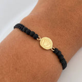 Pulsera Tejida Negra Corona Rx 0.65gr / Oro Amarillo 18K $