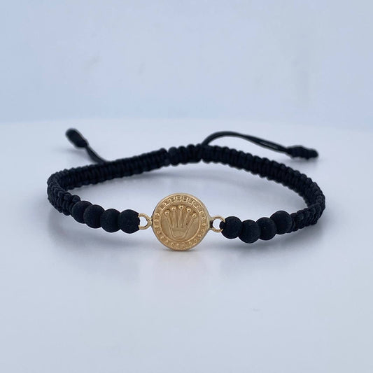 Pulsera Tejida Negra Corona Rx 0.65gr / Oro Amarillo 18K $