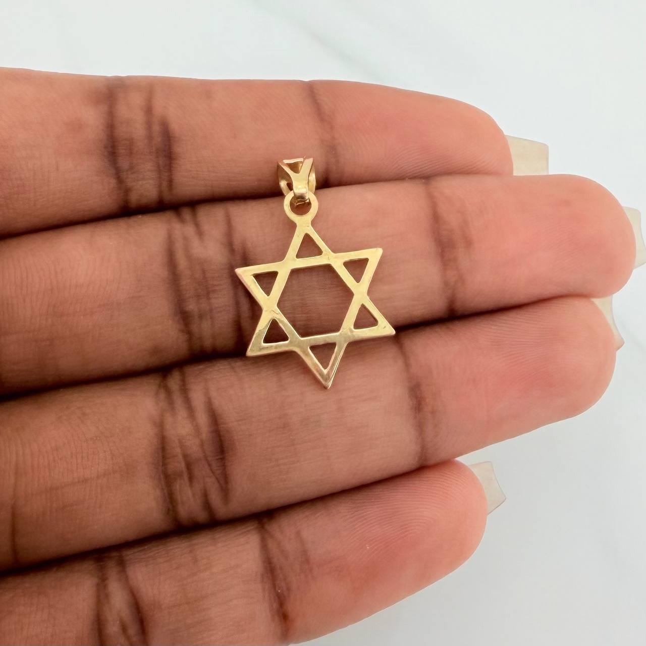 Dije Silueta Estrella 1.3gr / 2.4cm / Oro Amarillo 18K %