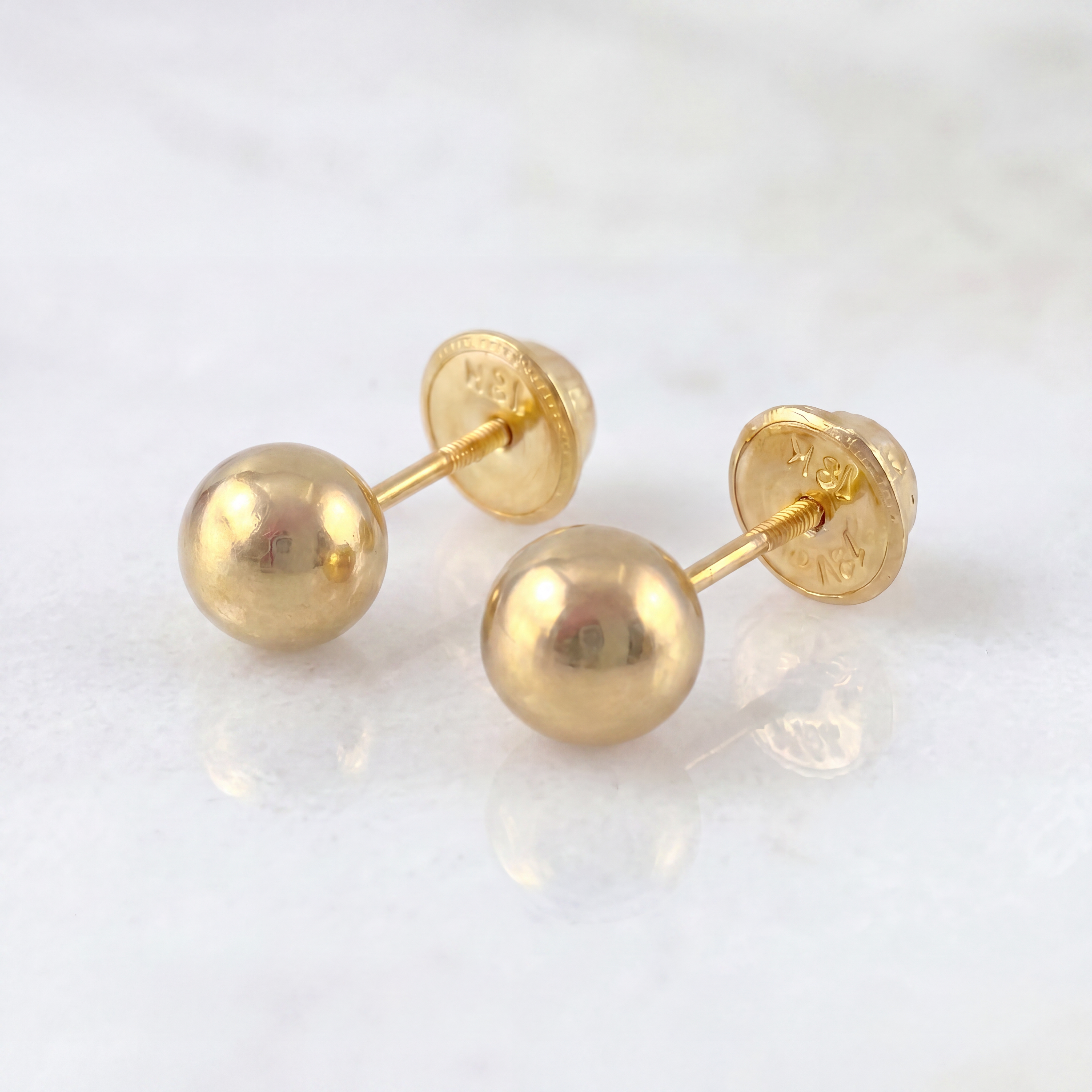 Topos Bola Lisa 0.85 g / 7 mm Oro Amarillo 18K