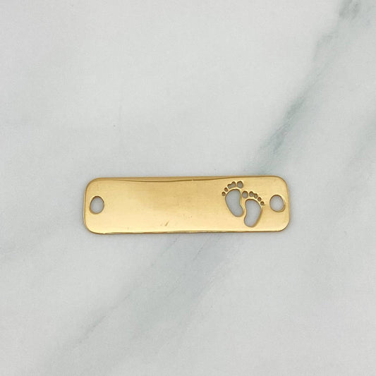 Herraje Placa Huellitas 0.85 g / 2.7 cm Oro Amarillo 18K