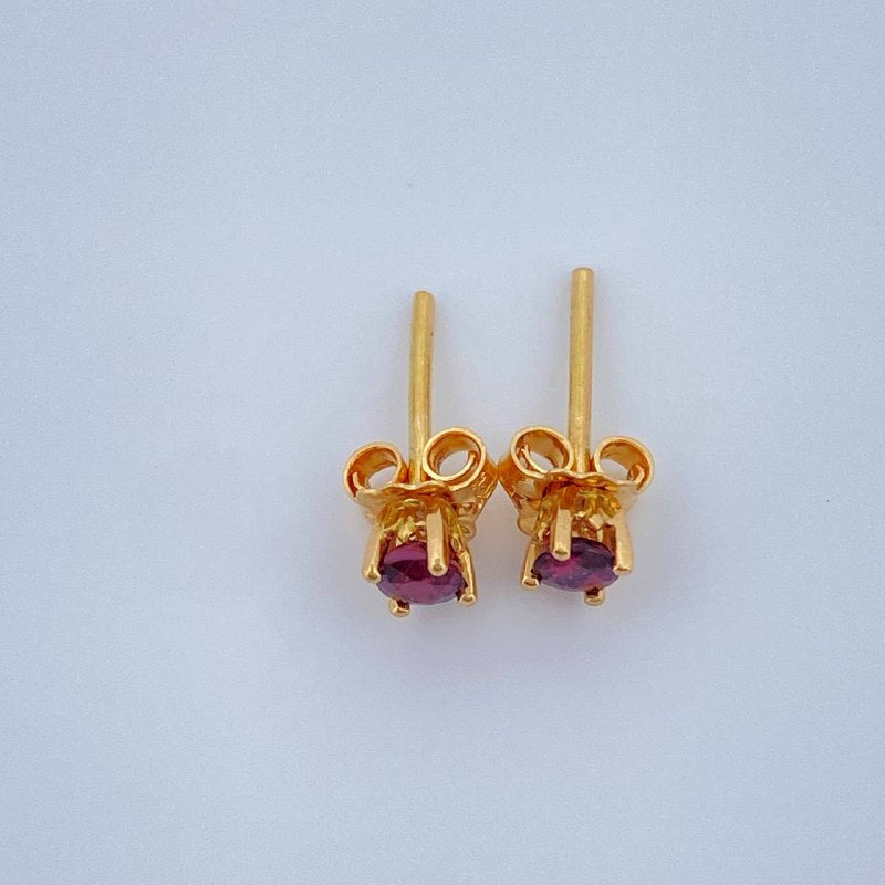 Topos Cuatro Garras Ruby 0.9gr / Oro Amarillo 18K %