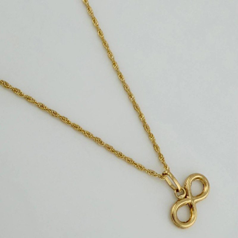 Set Cadena Lazo + Dije Infinito / 1,35 gr / 46 cm Oro Amarillo 18K