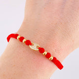 Pulsera Tejida Rojo Herraje de GC Bolas Lisas Oro Amarillo 18K