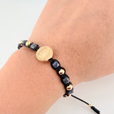 Pulsera Negra Herraje Virgen Guadalupe 1.58gr / 5mm-3mm Oro Amarillo 18K *