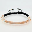 Pulsera Negra Herraje Cilindro 4.6gr / 5mm-3mm Dos Oros Blanco Rosa 18K *