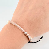 Pulsera Negra Herraje Cilindro 4.6gr / 5mm-3mm Dos Oros Blanco Rosa 18K *